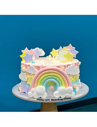 Ombre Pastel Rainbow with Stars and Clouds Cake