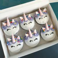 Purple Unicorn Character Cupcakes