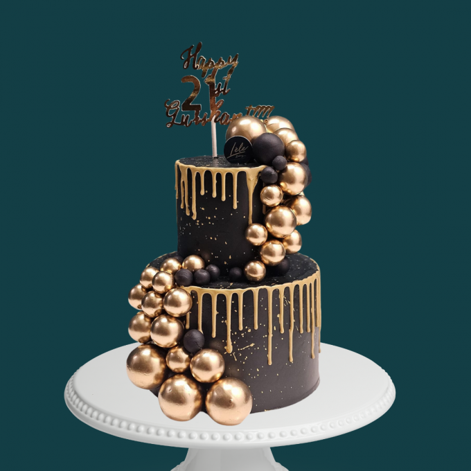 Custom black and gold celebration cake by LÉLE Bakery