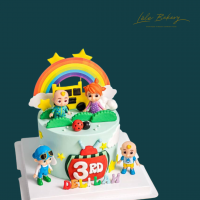 Cocomelon Character and Rainbow Cake