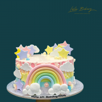 Ombre Pastel Rainbow with Stars and Clouds Cake