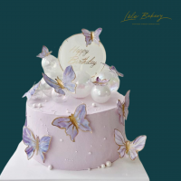 Pastel Purple Butterflies Cake