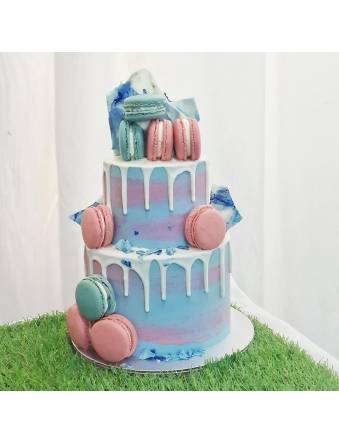 Blue with pink hues and macarons cake